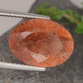 Pedra do sol laranja natural 5,25ct, corte oval, translúcido