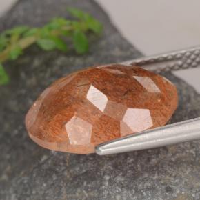Pedra do sol laranja natural 5,25ct, corte oval, translúcido