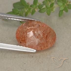 Pedra do sol laranja natural 3,83ct, corte oval, translúcido