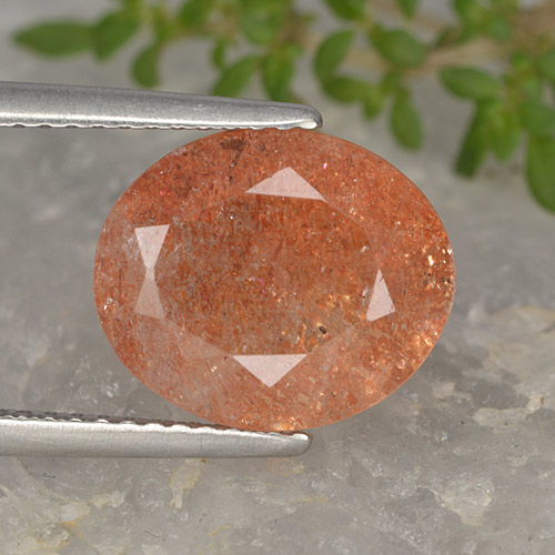 Pedra do sol laranja natural 3,94ct, corte oval, translúcido