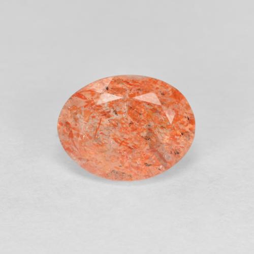 Pedra do sol laranja natural 1,37ct, corte oval, translúcido