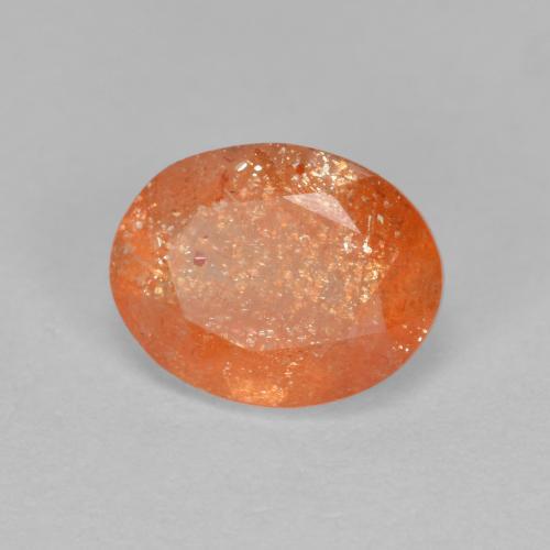Pedra do sol laranja natural 1,31ct, corte oval, translúcido