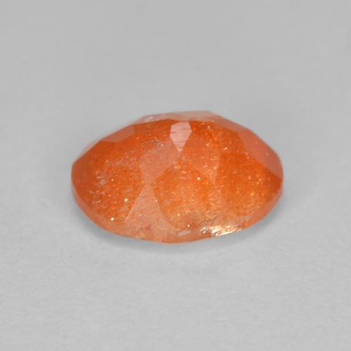 Pedra do sol laranja natural 1,31ct, corte oval, translúcido