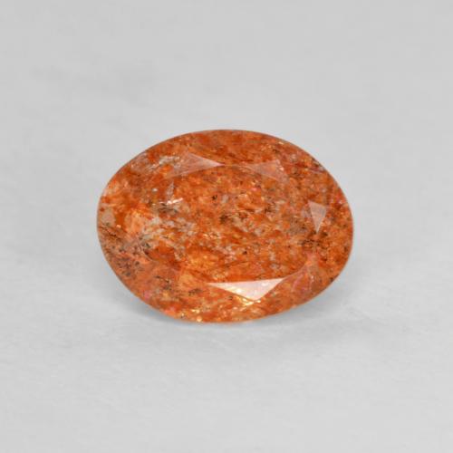 Pedra do sol laranja natural 1,27ct, corte oval, translúcido