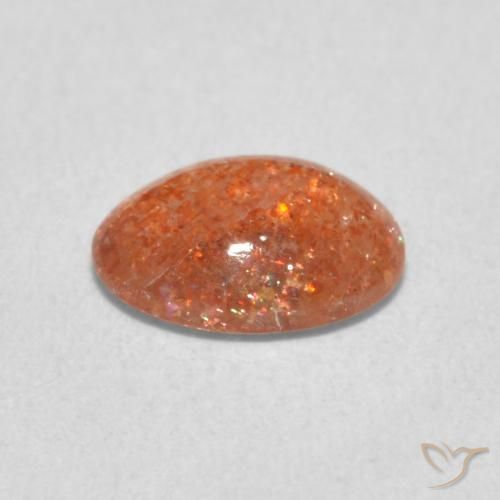 Pedra do Sol Laranja Médio Natural 1.04ct, oval, Translúcido