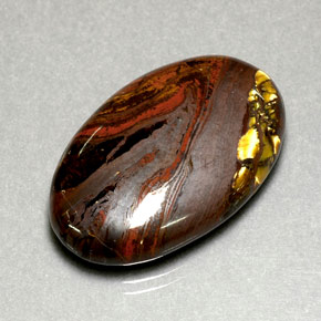 Tiger's eye matrix multicolorido natural 35,49ct, corte oval, opaco