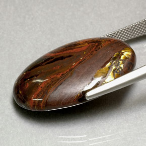Tiger's eye matrix multicolorido natural 35,49ct, corte oval, opaco