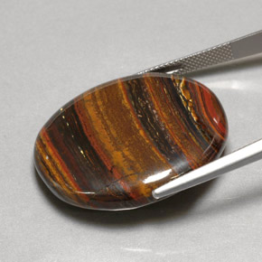 Tiger's eye matrix multicolorido natural 53,09ct, corte oval, opaco
