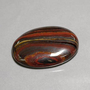 Tiger's eye matrix multicolorido natural 45,58ct, corte oval, opaco