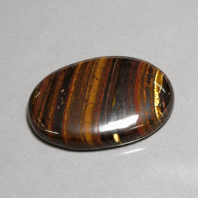 Tiger's eye matrix multicolorido natural 43,53ct, corte oval, opaco