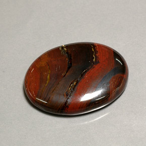 Tiger's eye matrix multicolorido natural 41,60ct, corte oval, opaco