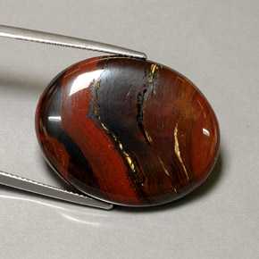 Tiger's eye matrix multicolorido natural 41,60ct, corte oval, opaco
