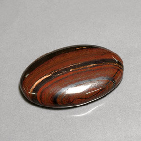 Tiger's eye matrix multicolorido natural 35,01ct, corte oval, opaco