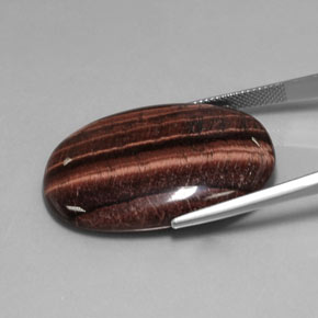 Tiger's eye matrix multicolorido natural 42,21ct, corte oval, opaco