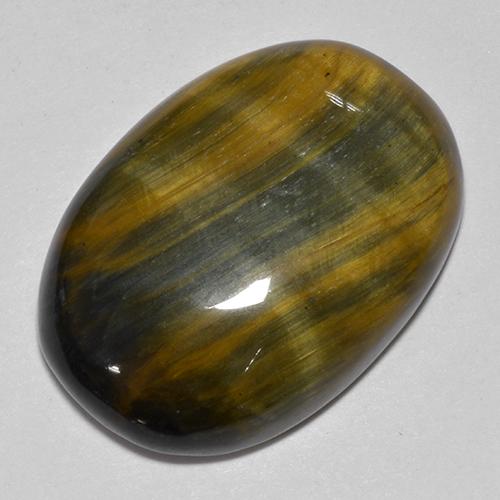 Tiger's eye multicolorido natural 24,37ct, corte oval, opaco