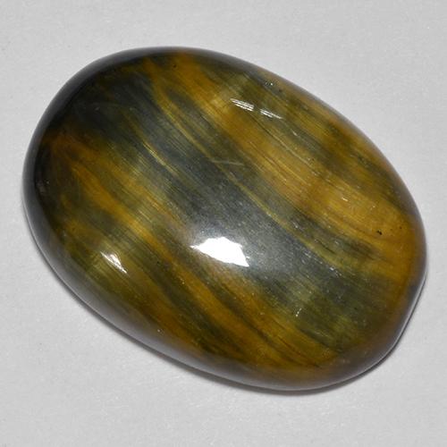 Tiger's eye multicolorido natural 24,37ct, corte oval, opaco