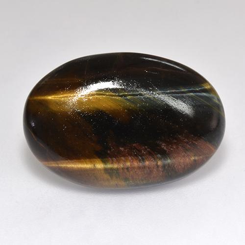 Tiger's eye multicolorido natural 18,46ct, corte oval, opaco