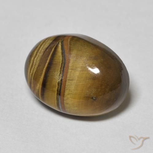 Olho de Tigre Marrom-amarelado Natural 6.95ct, oval, Opaco