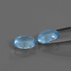 Pedras preciosas de topázio azul suíço natural de 1,59 ct, corte oval, transparente