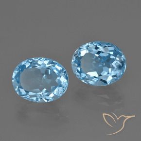 Pedras preciosas de Topázio Céu azul natural de 6.89 ct, Corte Oval, VVS-VS