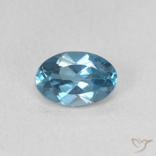 Topázio azul Londres solto de 0,61 quilates, corte oval de 6,1 x 4,1 mm do Brasil, Photo A