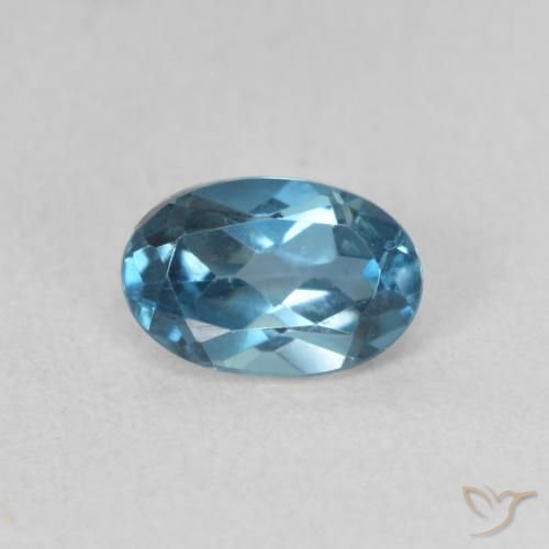 Topázio azul Londres solto de 0,64 quilates, corte oval de 6,1 x 4,1 mm do Brasil, Photo A