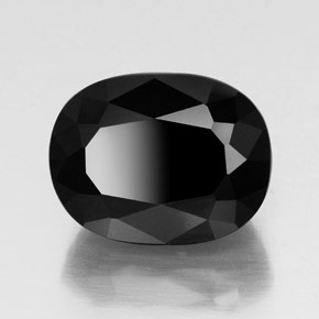 Turmalina preto natural 24,64ct, corte oval, opaco