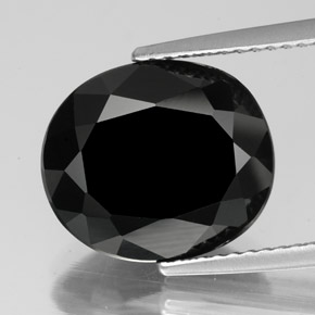 Turmalina preto natural 6,33ct, corte oval, opaco