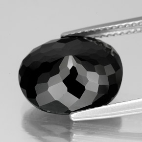 Turmalina preto natural 6,33ct, corte oval, opaco