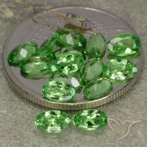 Pedras preciosas de Granada Tsavorita verde vivo natural de 3.22 ct, oval, VS