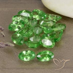 Pedras preciosas de Granada Tsavorita verde intenso natural de 4.86 ct, oval, VS