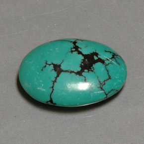 Turquesa verde natural 12,26ct, corte oval, opaco