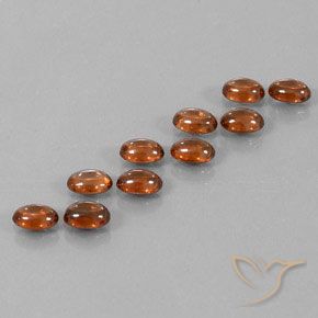 Pedras preciosas de Zircão Laranja escuro natural de 7.72 ct, oval, Transparente