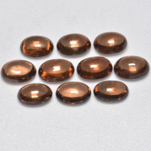 Pedras preciosas de Zircão Marrom Quente natural de 7.86 ct, Corte Oval, Transparente