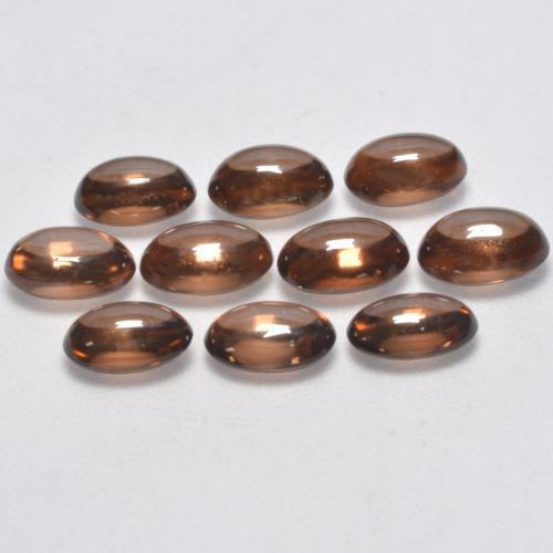 Pedras preciosas de Zircão Marrom Quente natural de 7.86 ct, Corte Oval, Transparente