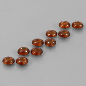 Pedras preciosas de zircão laranja natural de 10,37 ct, corte oval, transparente