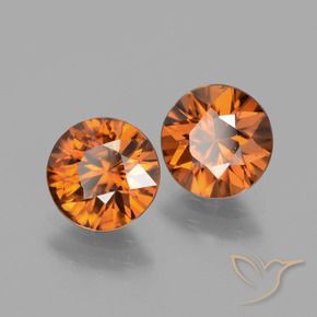 Pedras preciosas de Zircão Laranja médio-escuro natural de 3.74 ct, Redondo, VS