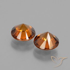 Pedras preciosas de Zircão Laranja médio-escuro natural de 3.74 ct, Redondo, VS