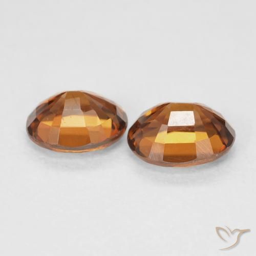 Pedras preciosas de Zircão Laranja Profundo natural de 1.96 ct, oval, VVS