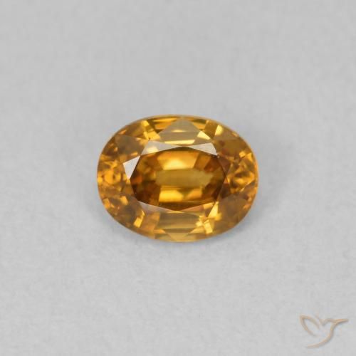 0.59ct Natural laranja marrom Zircão, oval, VVS-VS