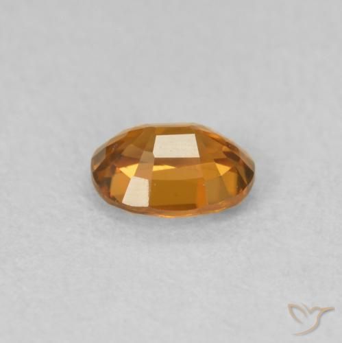Zircão Laranja Profundo Natural 0.60ct, oval, VVS-VS