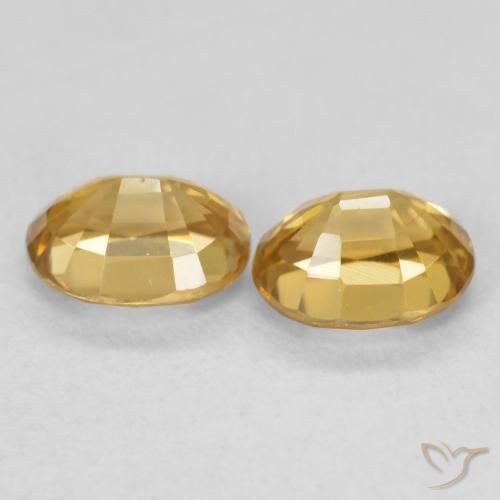 Pedras preciosas de Zircão ouro profundo natural de 1.31 ct, oval, VVS-VS