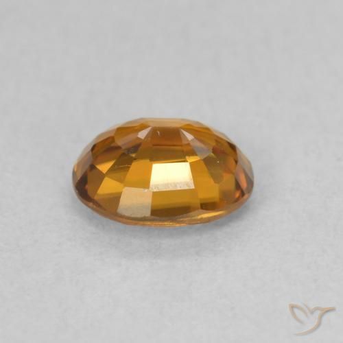 Zircão Laranja Profundo Natural 0.88ct, oval, VVS-VS