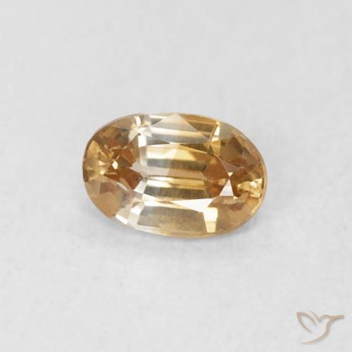 Zircão Pêssego Dourado Natural 0.72ct, oval, VVS-VS