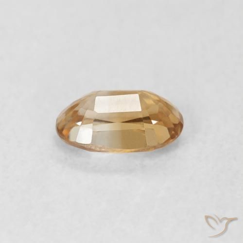Zircão Pêssego Dourado Natural 0.72ct, oval, VVS-VS