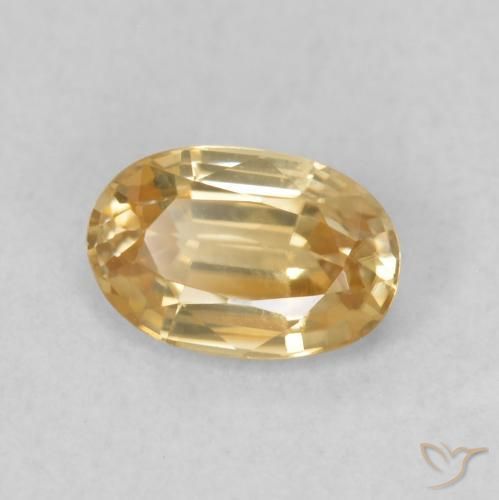 Zircão Dourado Pêssego Claro Natural 0.68ct, oval, VVS-VS