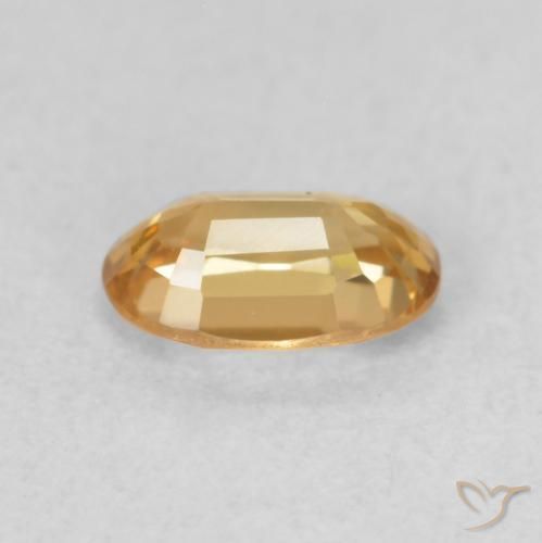 Zircão Dourado Pêssego Claro Natural 0.68ct, oval, VVS-VS