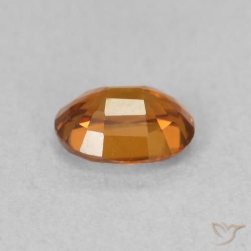 Zircão Laranja Profundo Natural 0.60ct, oval, VVS-VS