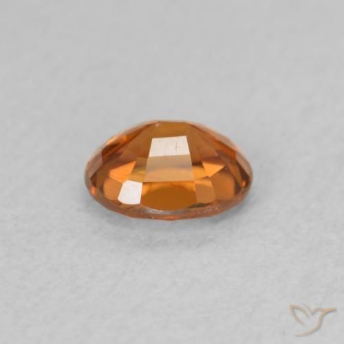 Zircão Laranja Profundo Natural 0.60ct, oval, VS