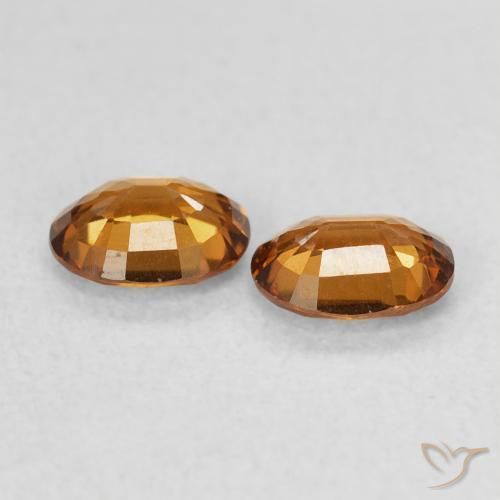 Pedras preciosas de Zircão Laranja Profundo natural de 0.98 ct, oval, VVS